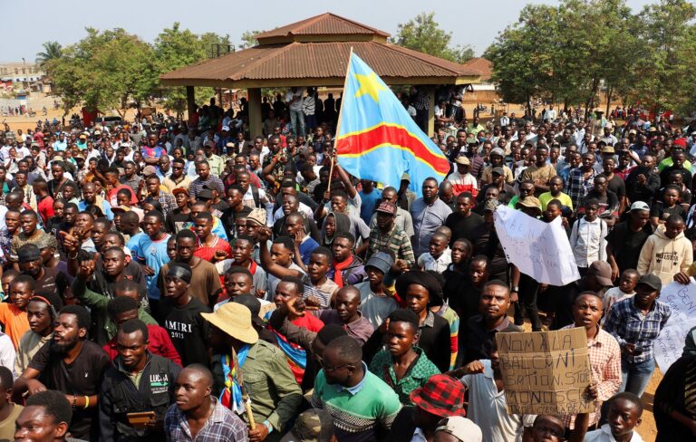 Congolese protesters gather at the Rwandan embassy in Washington, calling for an end to aggression.