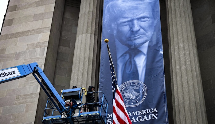 Trump Banner Unveiled Outside Justice Department Headquarters